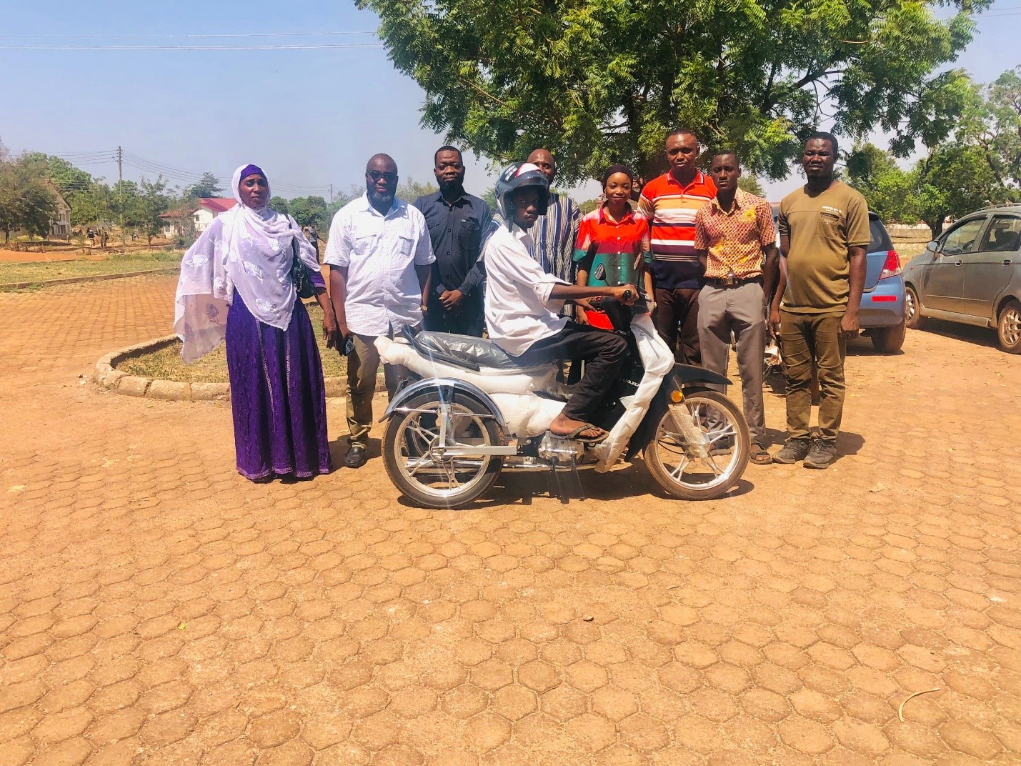 Might Ghana Limited Donates a Motorbike to a Differently Able Student of the University for Development Studies (UDS)