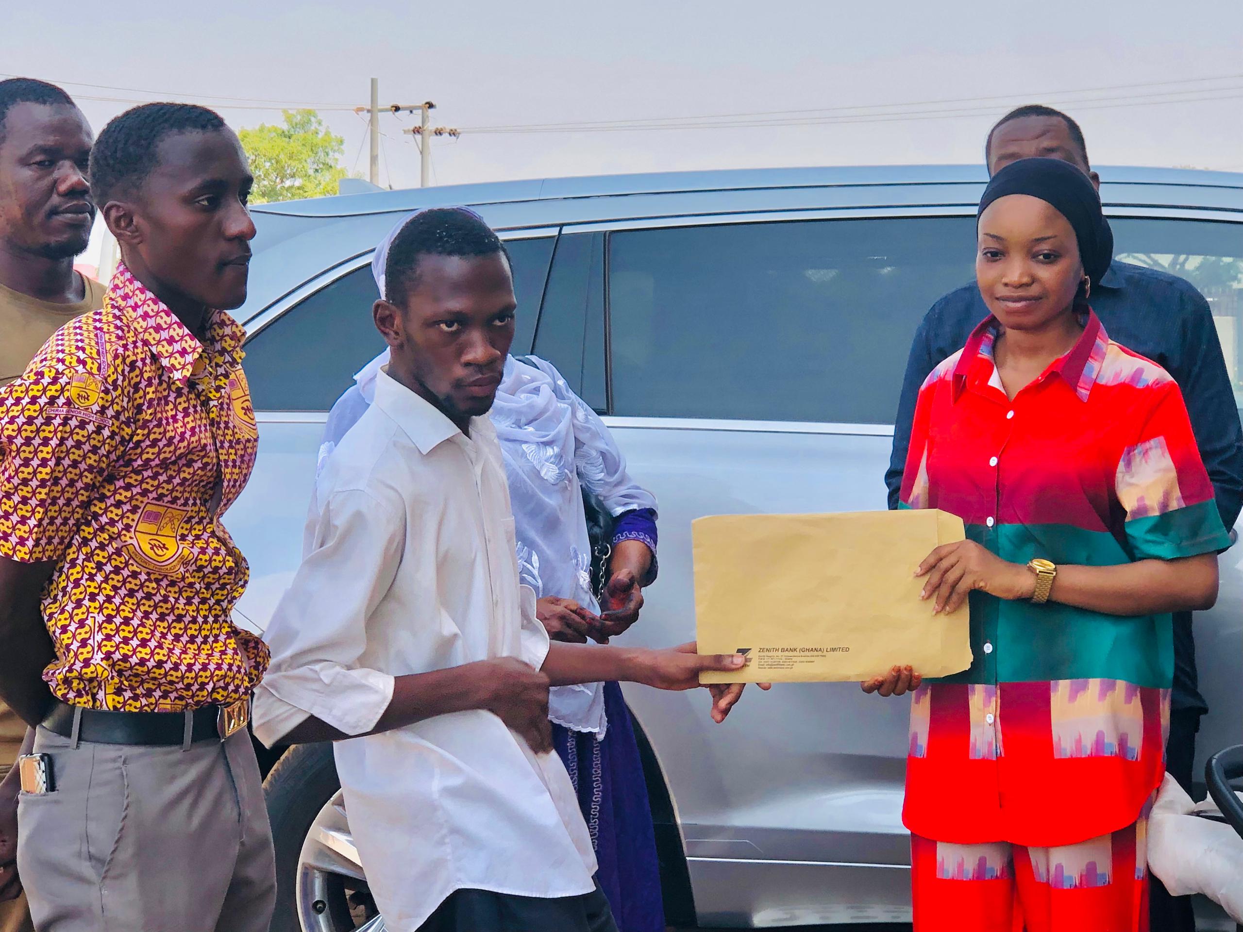 Might Ghana Limited Donates Motorbike to A Disabled Student of UDS
