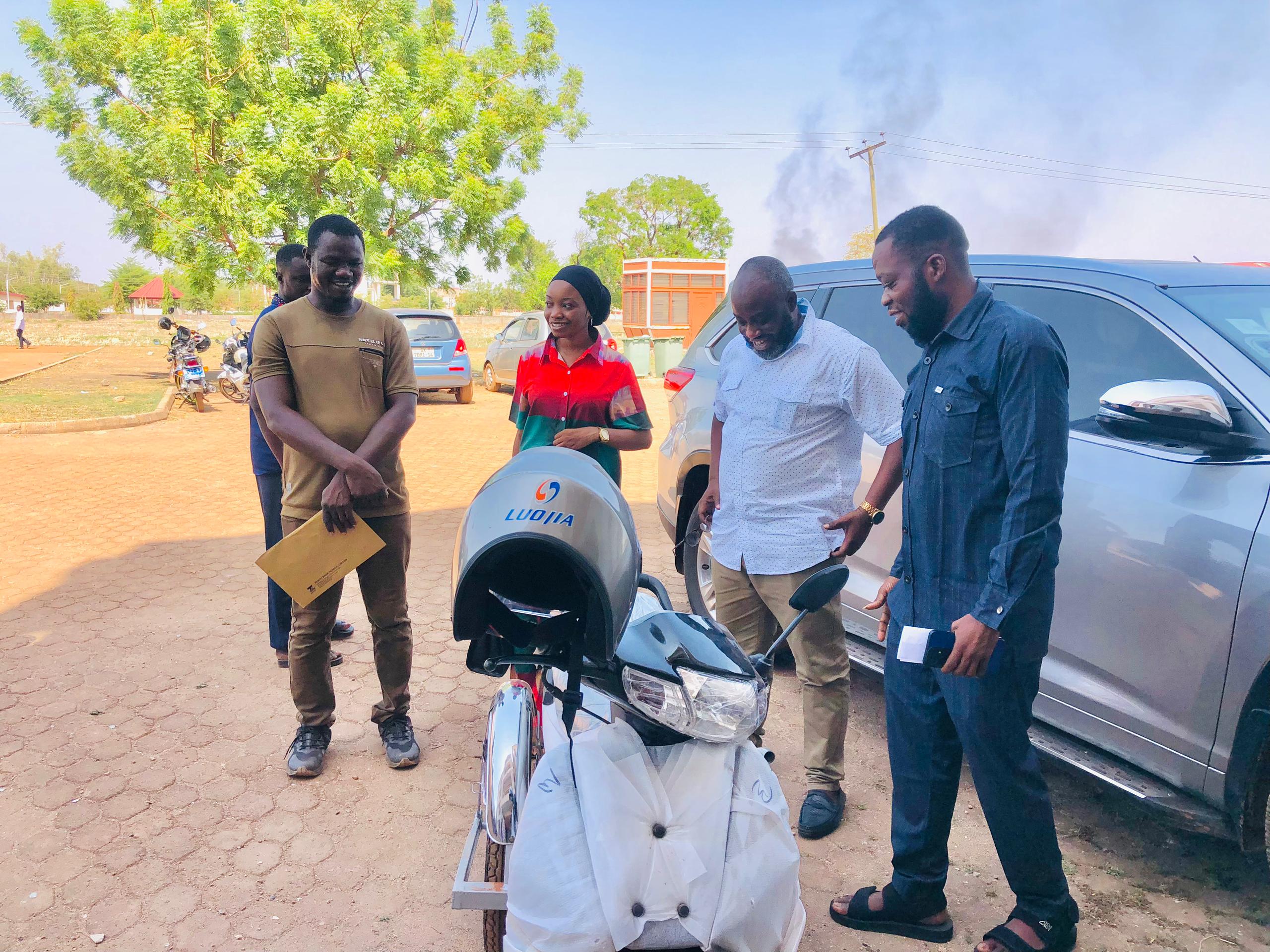 Might Ghana Limited Donates Motorbike to A Disabled Student of UDS